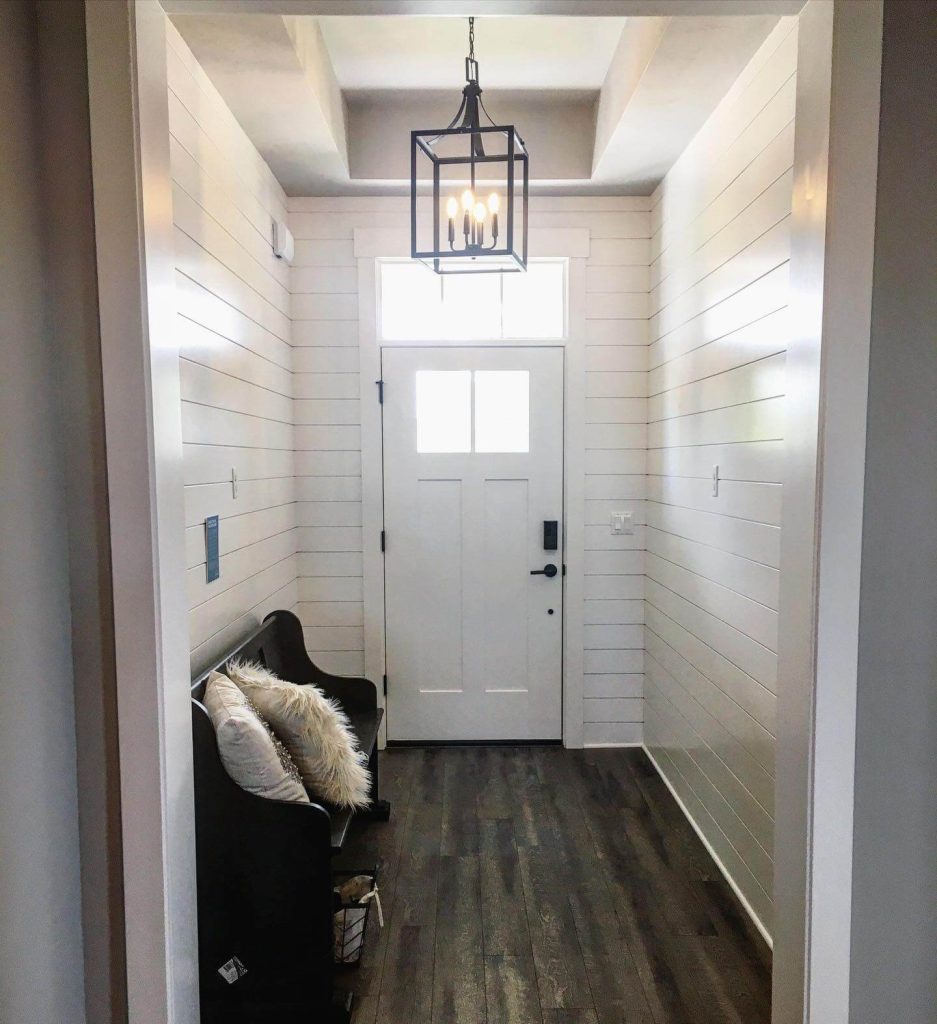14. Bright and Structured Transitional Foyer