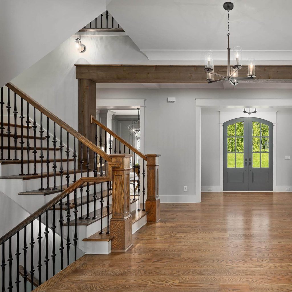 15. Elevate with Stained Wood and Iron Details