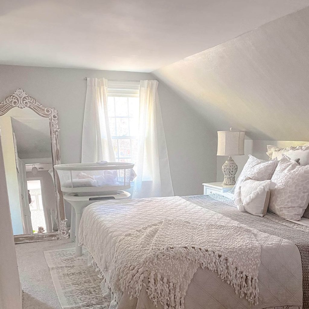 16. Bring in Romantic Elegance with a White Ornate Mirror