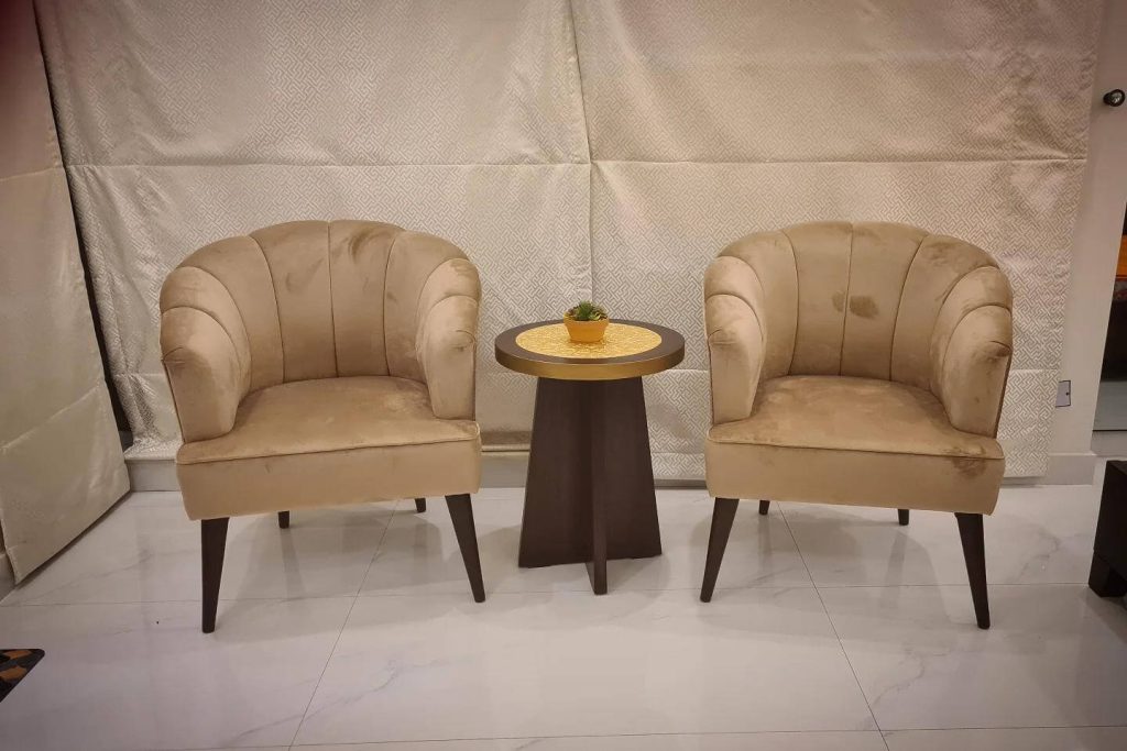 19. Soft Gold Shell Chairs for Warm Neutrals