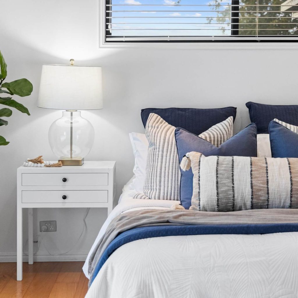 2. Elegant Coastal Escape with Soaring Ceilings