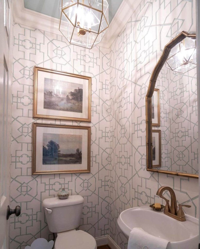 2. Geometric Wallpaper and Gold Accents