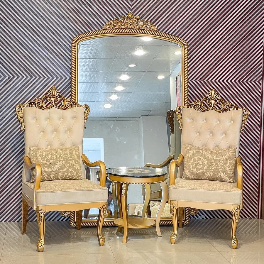 2. Royal Elegance with Ornate Classic Chairs