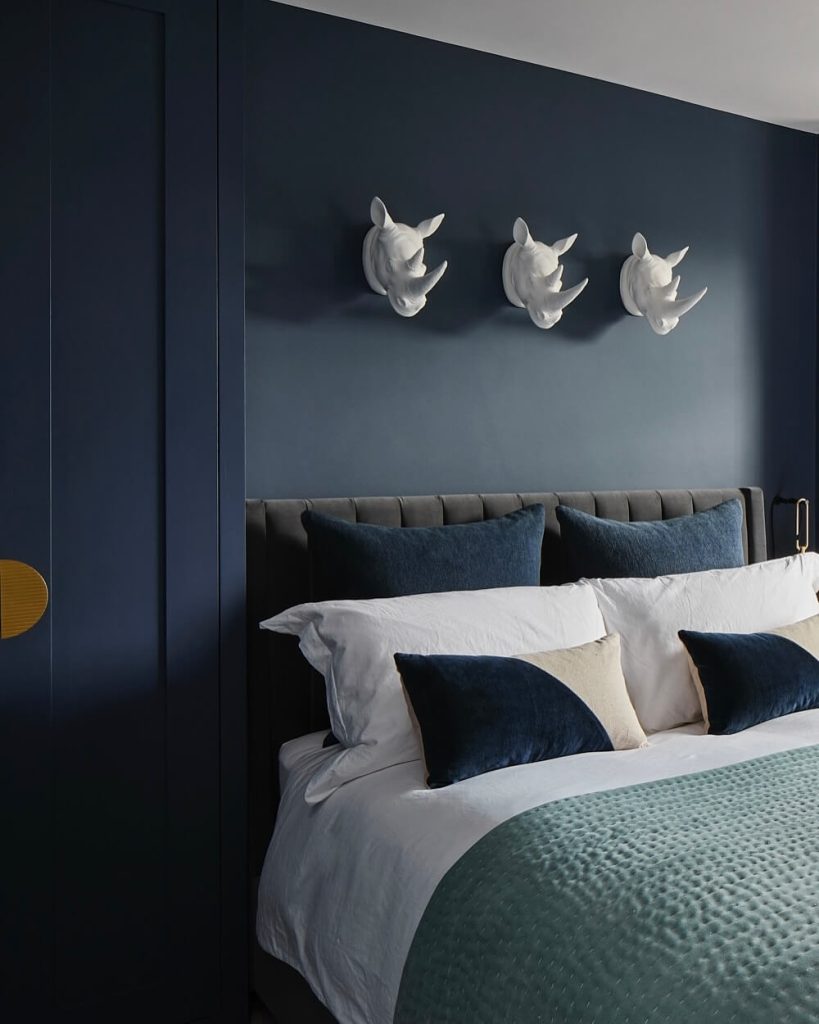 20. Vintage Vibes with Navy and Mustard Accents