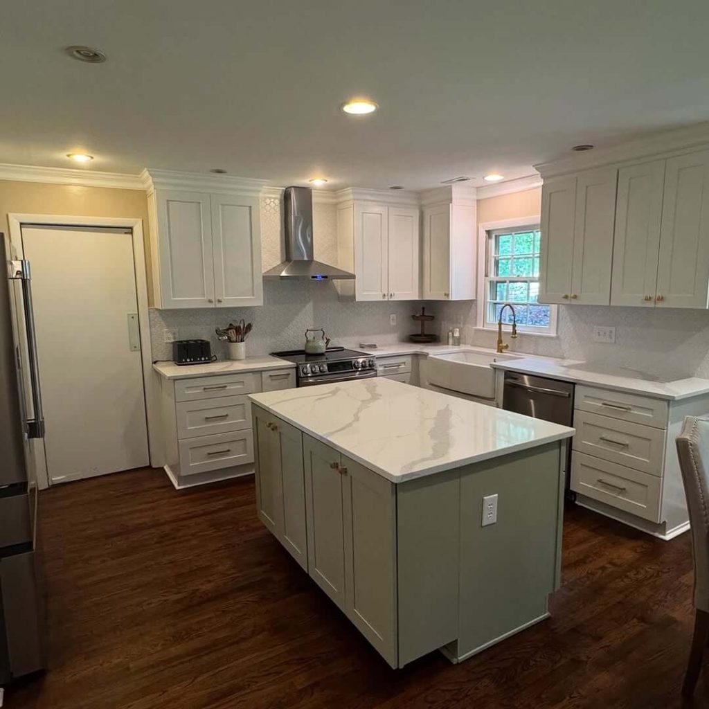 20. Sage Green Island with Classic White Perimeter Cabinets