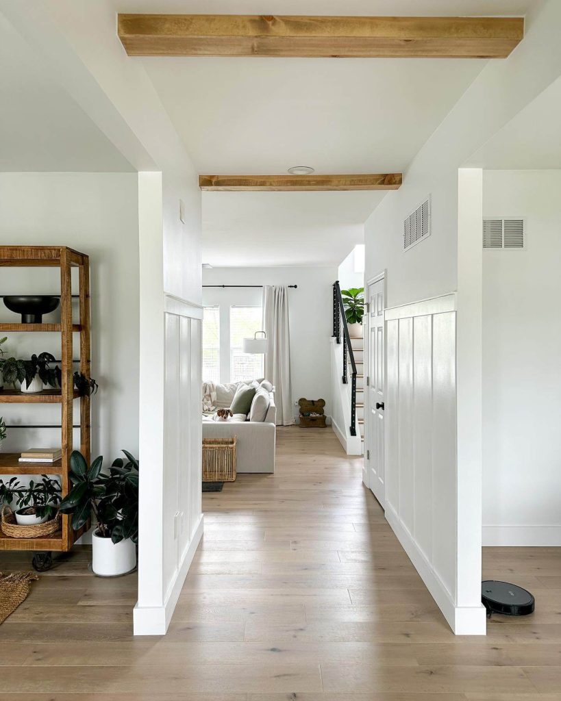 21. Bright and Airy with Vertical Paneling and Exposed Beams