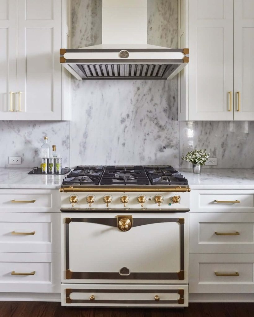 22. All-White with Brass and Marble for a French Luxury Aesthetic