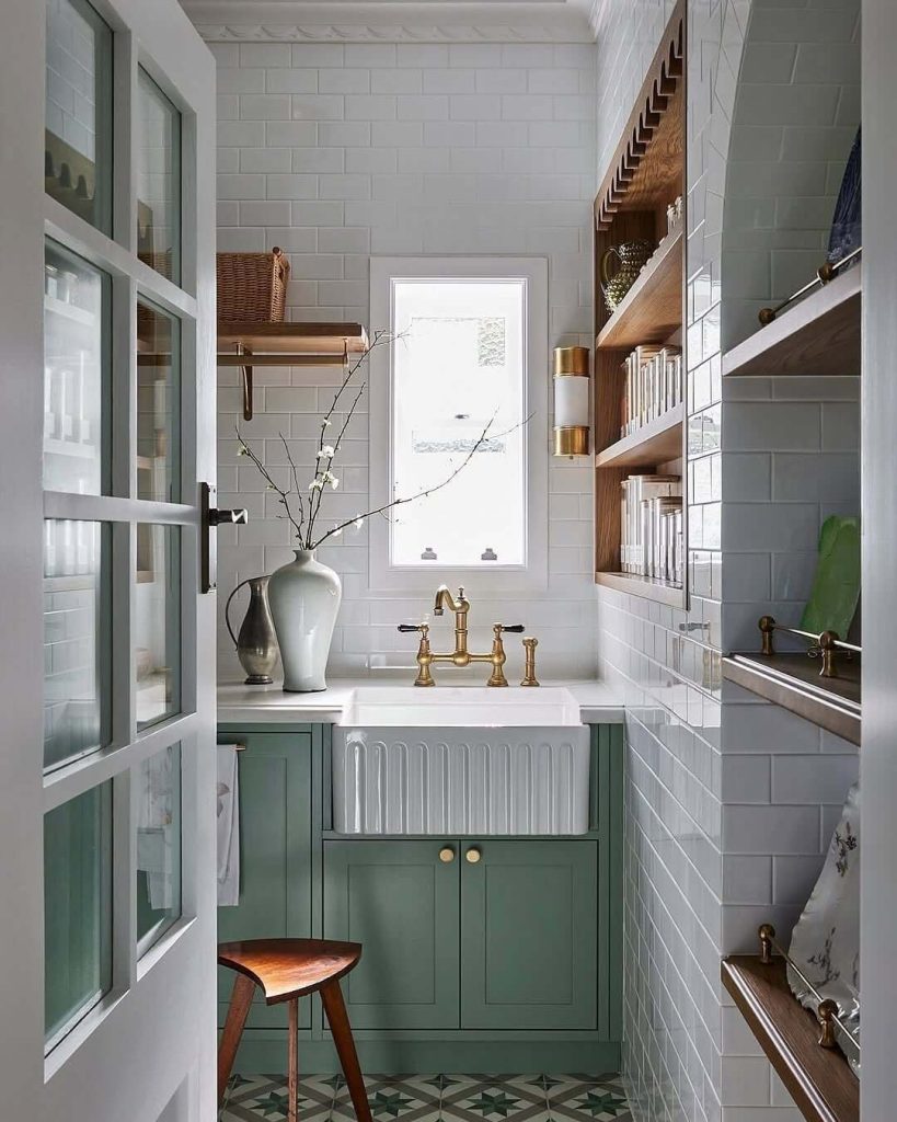 23. Sage Green Cabinets for a Vintage Cottage Vibe