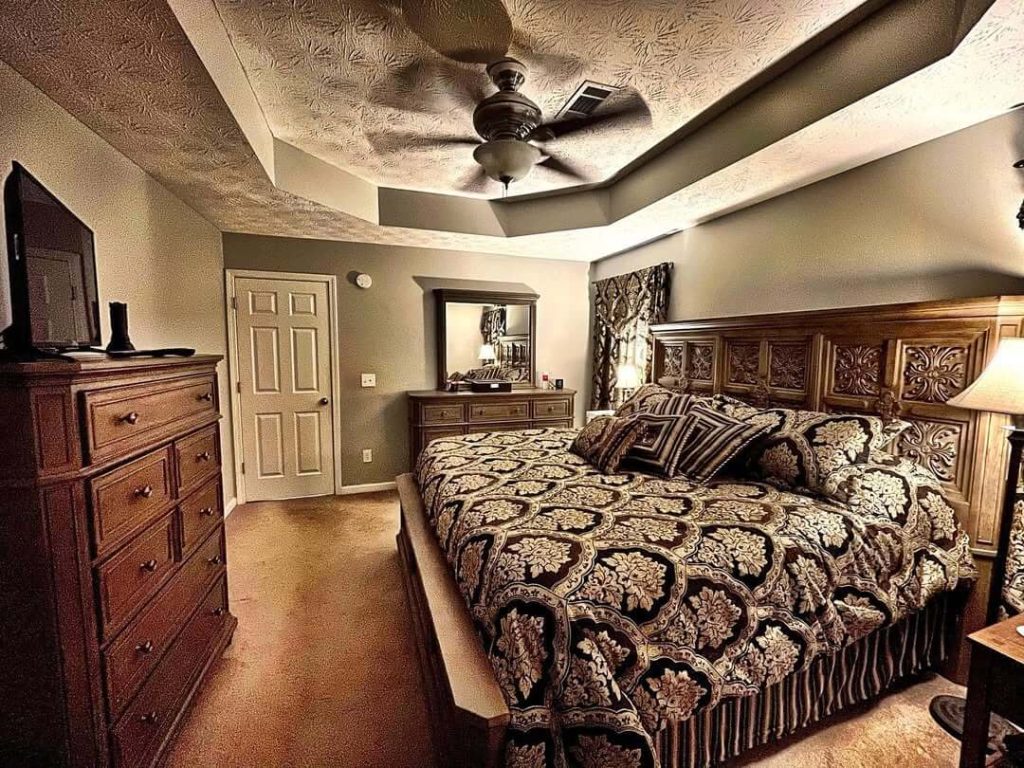 24. Rich and Regal Traditional Bedroom