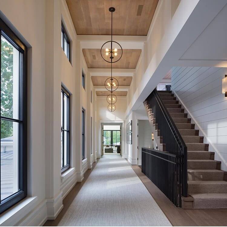 26. Modern Elegance with Dramatic Hallway Views