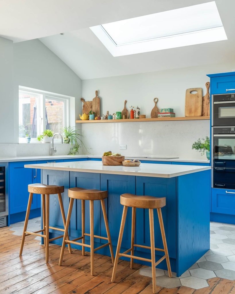 27. Sunlit Simplicity with Playful Blue and Natural Wood