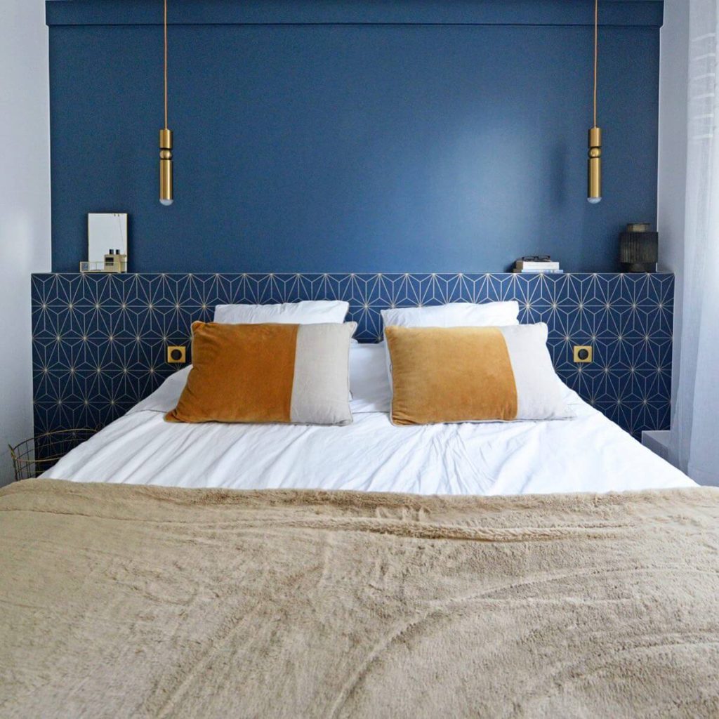 29. Cozy Lighting in a Deep Blue Cocoon