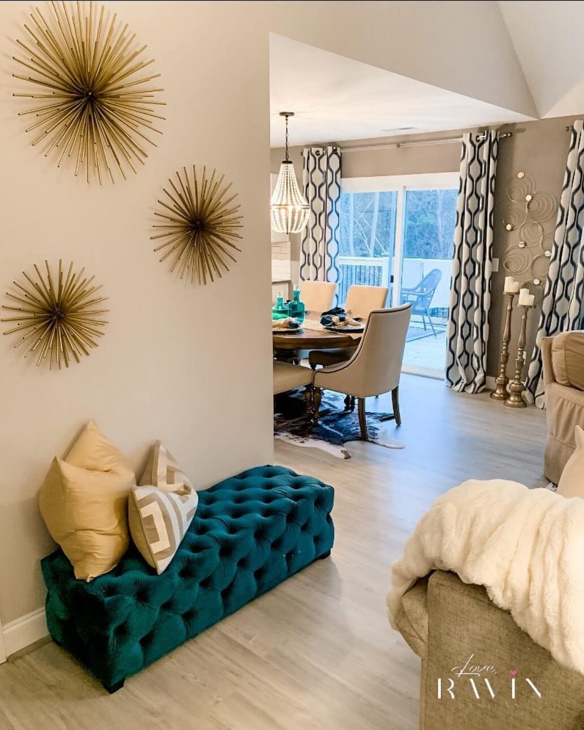 3. Add Glam with Wall Sculptures and Velvet Seating