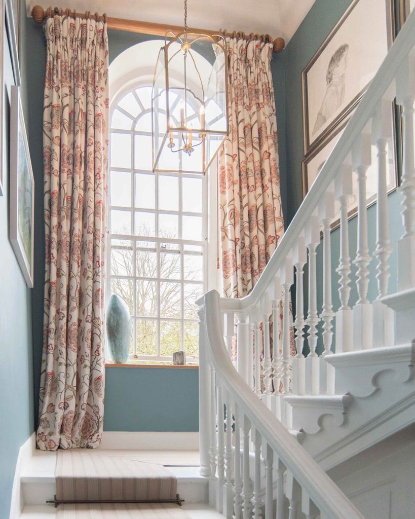 5. Frame the View with Drapes and Natural Light