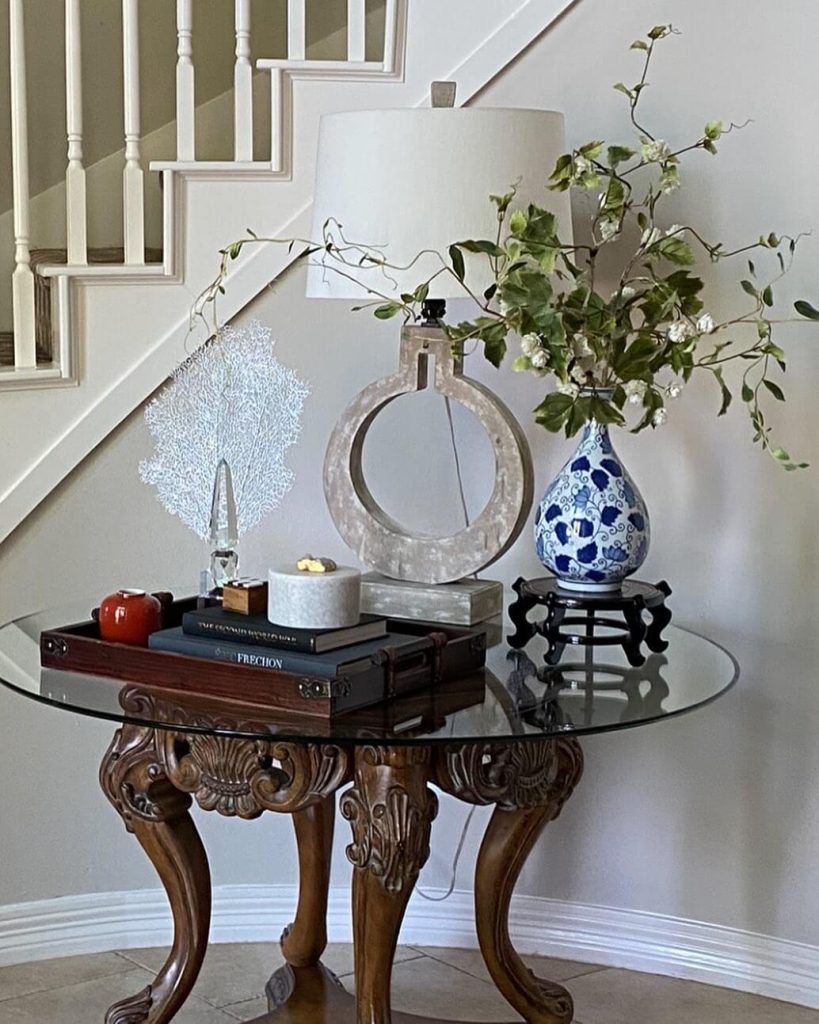 8. Traditional Charm with Glass-Top Refinement