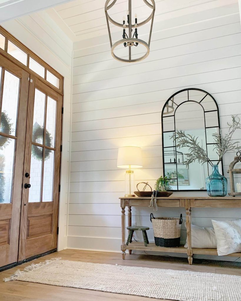 8. Grand Welcome with Natural Wood and Warm Textures