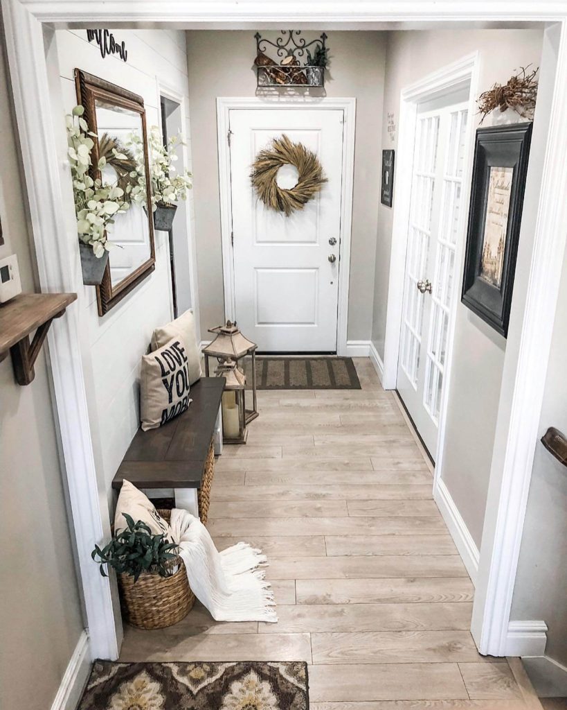 9. Layered Farmhouse Look with Subtle Shiplap Charm