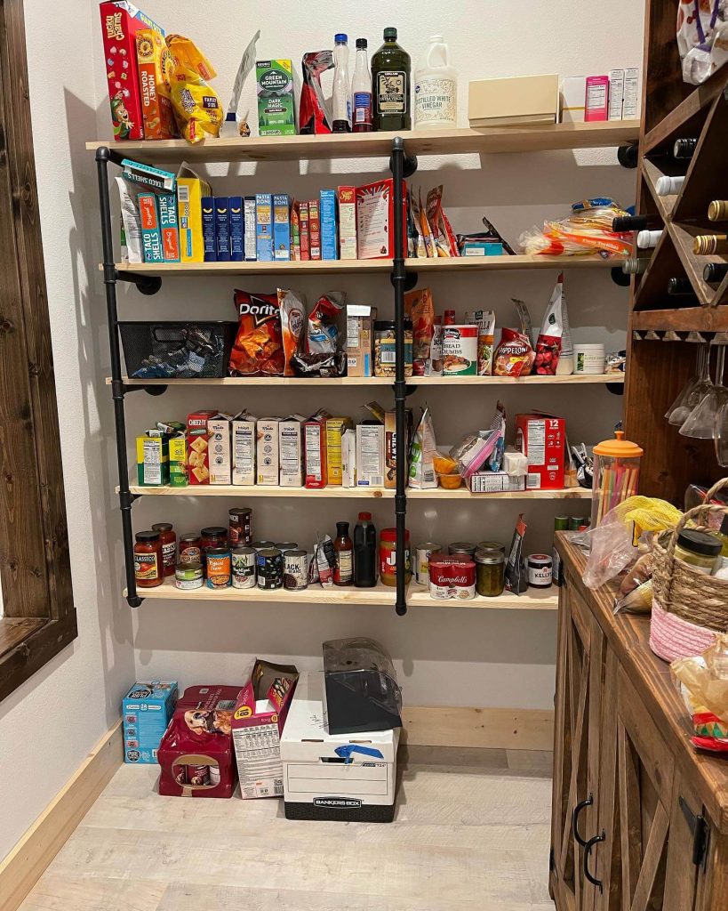 10. Try Industrial Pipe Shelving for a Unique, Open Concept