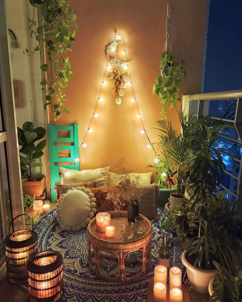 10. Boho-Chic Balcony Lounge with Candle Glow