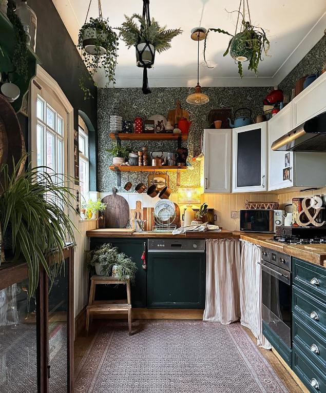 10. Greenery and Earthy Charm with Shelves Above Cabinets