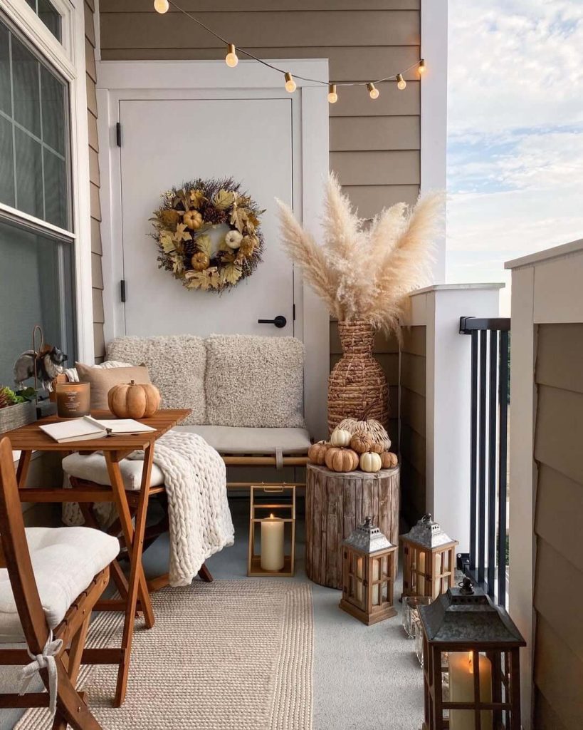 12. Autumn-Inspired Balcony with Rustic Decor