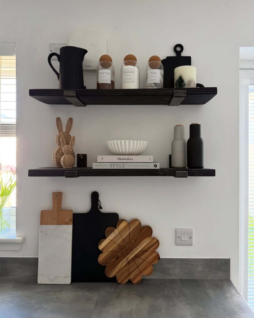 12. Minimalist Black Shelves for Modern Contrast