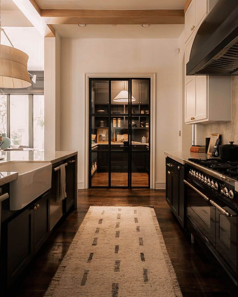 13. Moody Sophistication with Black Framed Double Doors