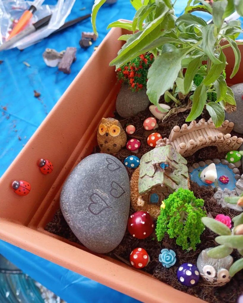 14. Colorful Fairy Habitat in a Window Box