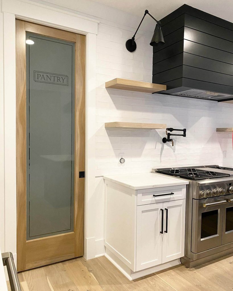 14. Minimalist Design with Frosted Glass and Light Wood