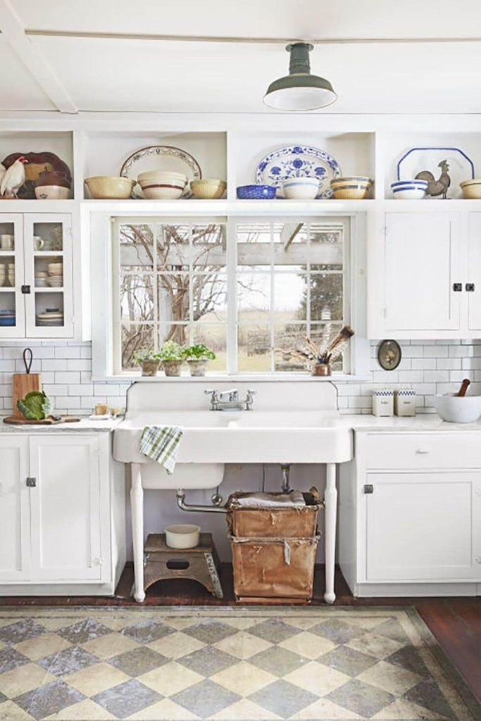 16. Charming Vintage Display Above the Sink