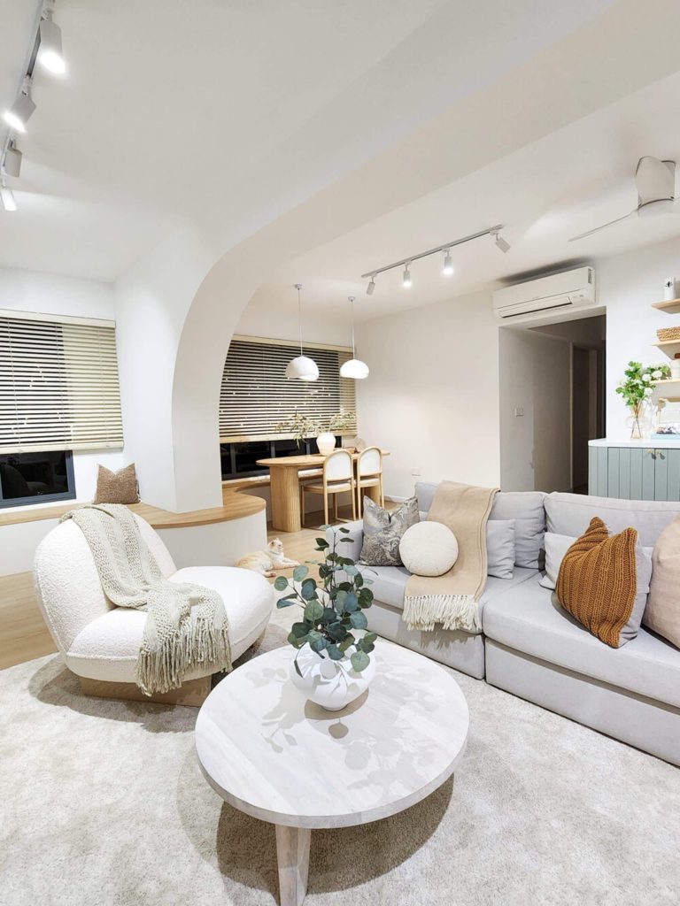 16. Japandi Interior Ideas Curved Sofa Cozy Lighting