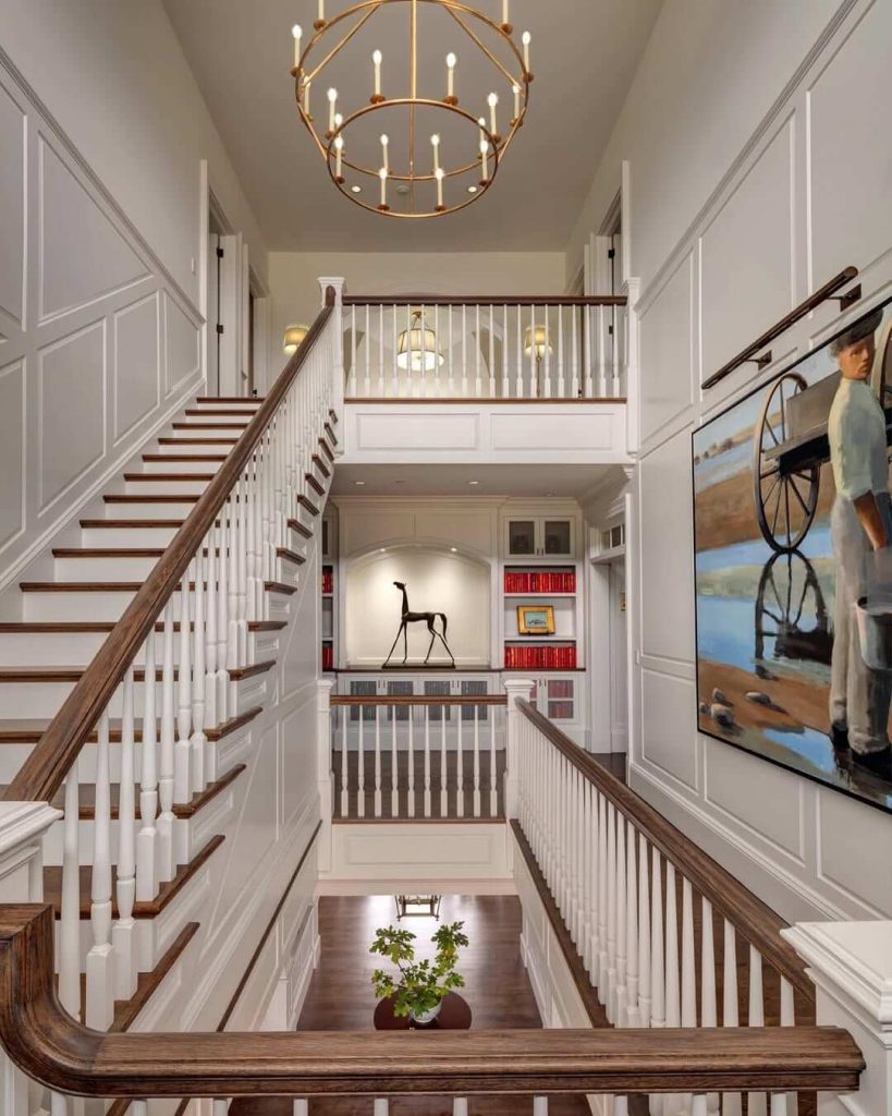 17. Classic Raised Paneling in Grand Stairwells