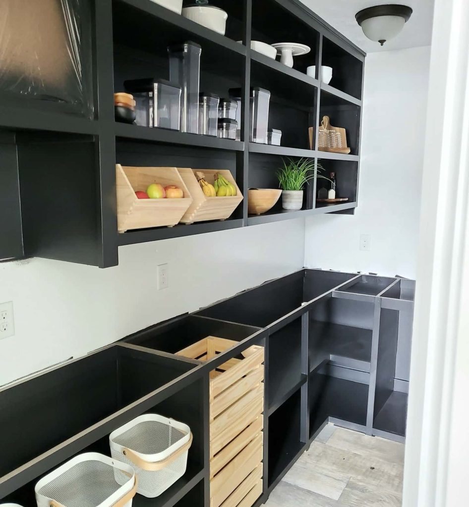 17. Go Bold with Black Built-In Shelving