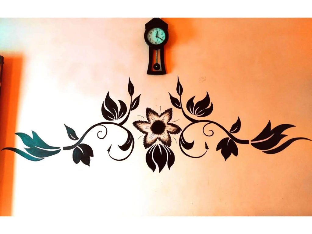 17. Elegant Symmetry with Black Floral Scrolls