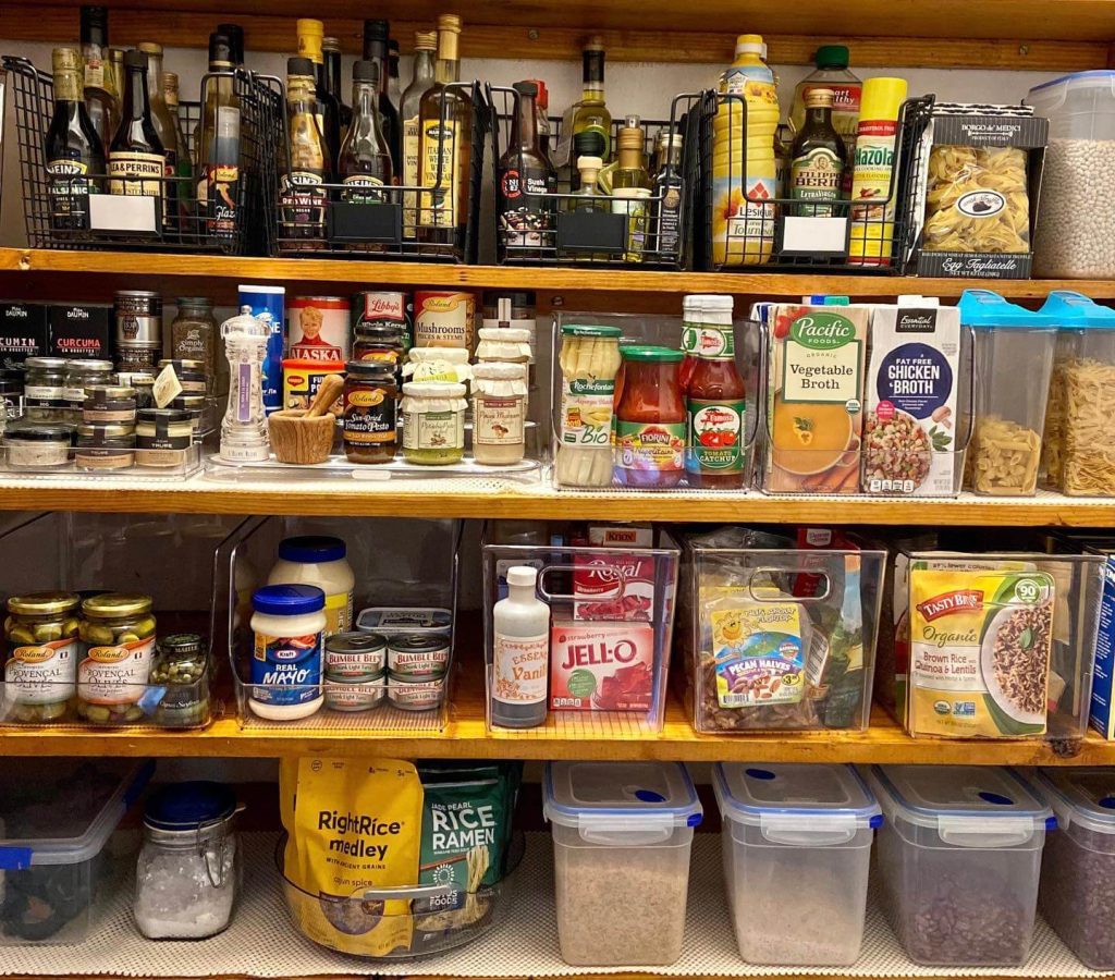 19. Layered Wood Shelving with Clear Bins for Easy Visibility