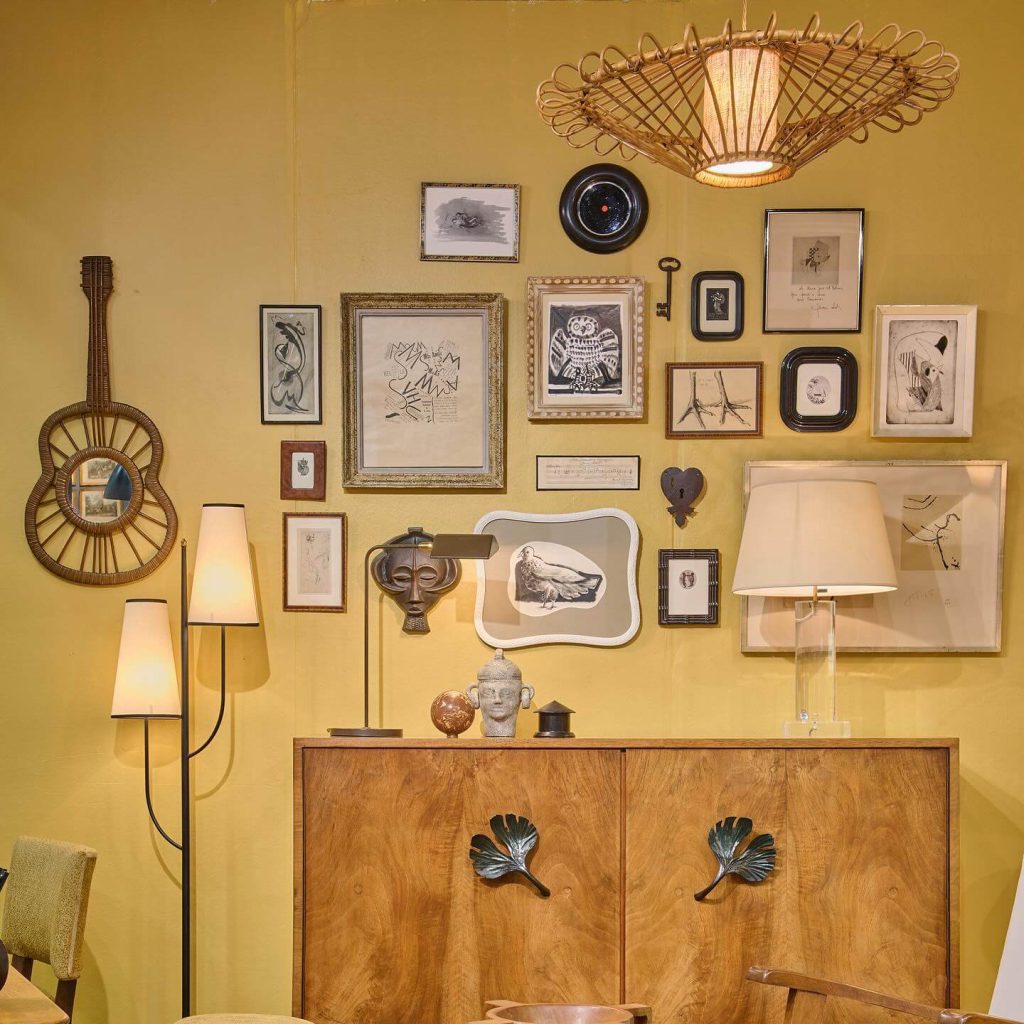 19. Golden Warmth: Vintage Frames Against Bold Colors