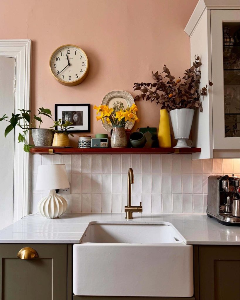 2. Bold Accents on a Minimal Shelf
