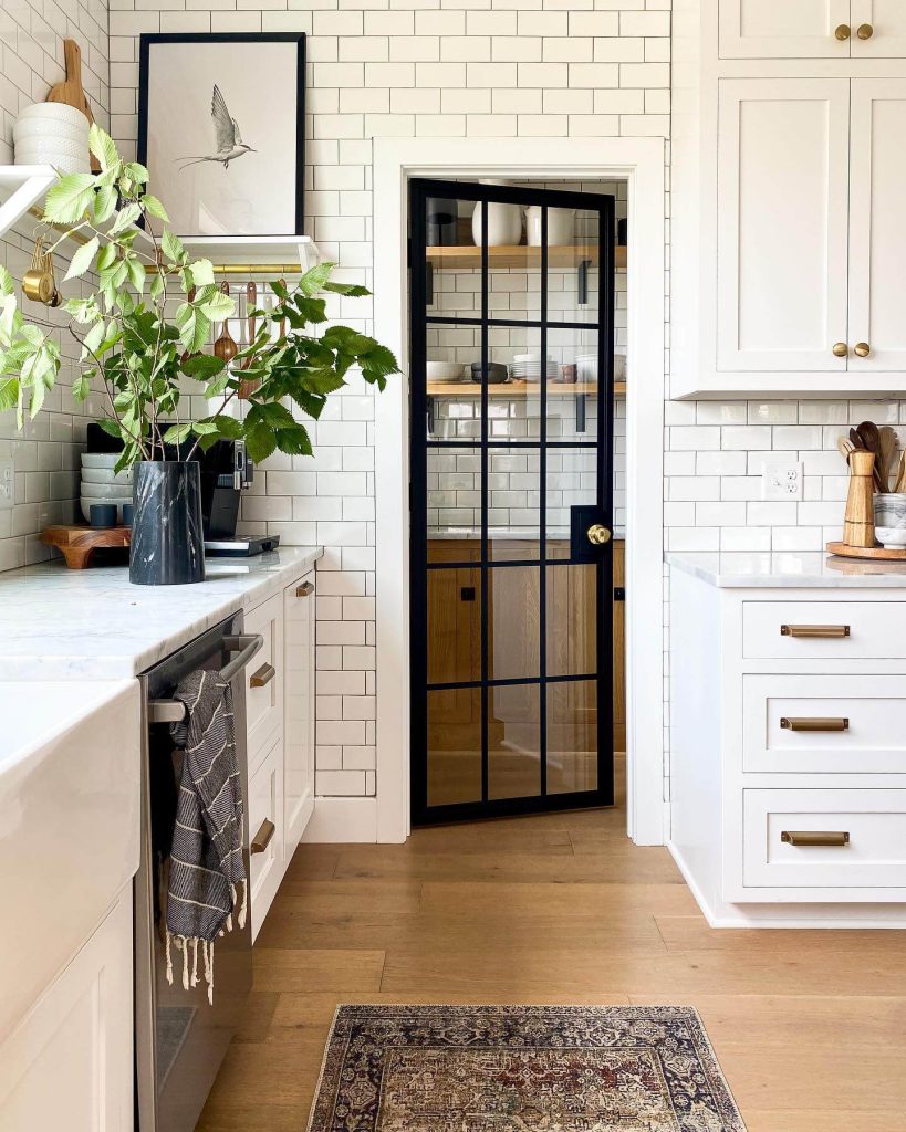 2. Industrial Edge with Black-Framed Glass Doors