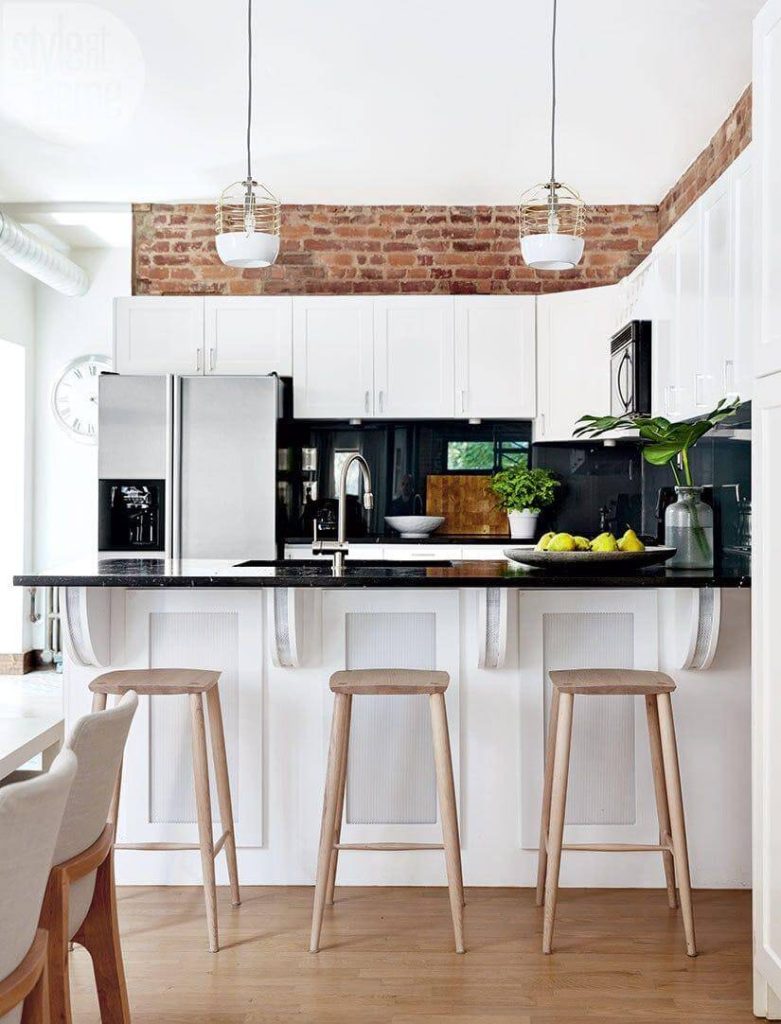 21. Industrial Charm with Exposed Brick and Sleek Minimalism