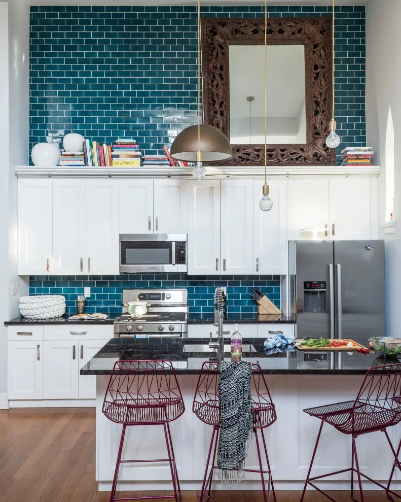 26. Creative Bookshelf Above the Kitchen Cabinets