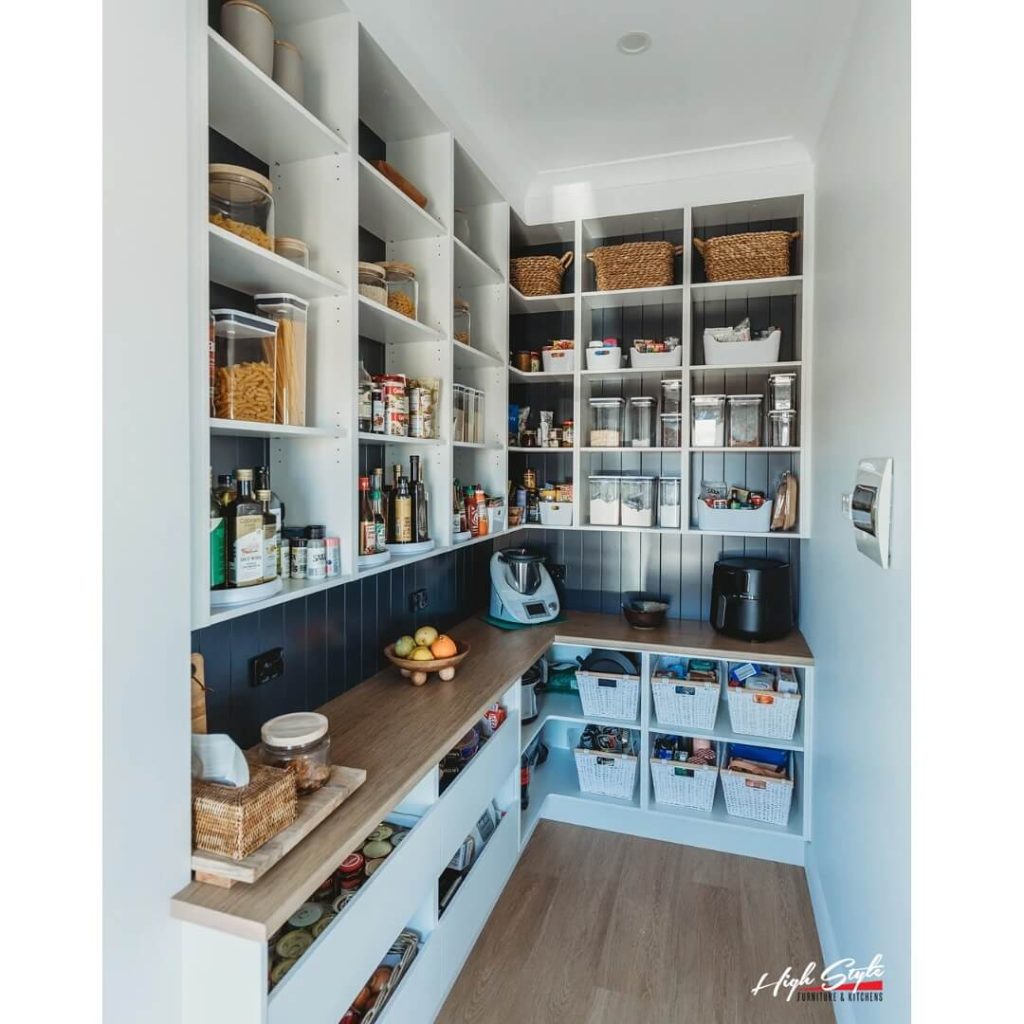 26. Highly Functional Pantry with Wall-to-Wall Storage