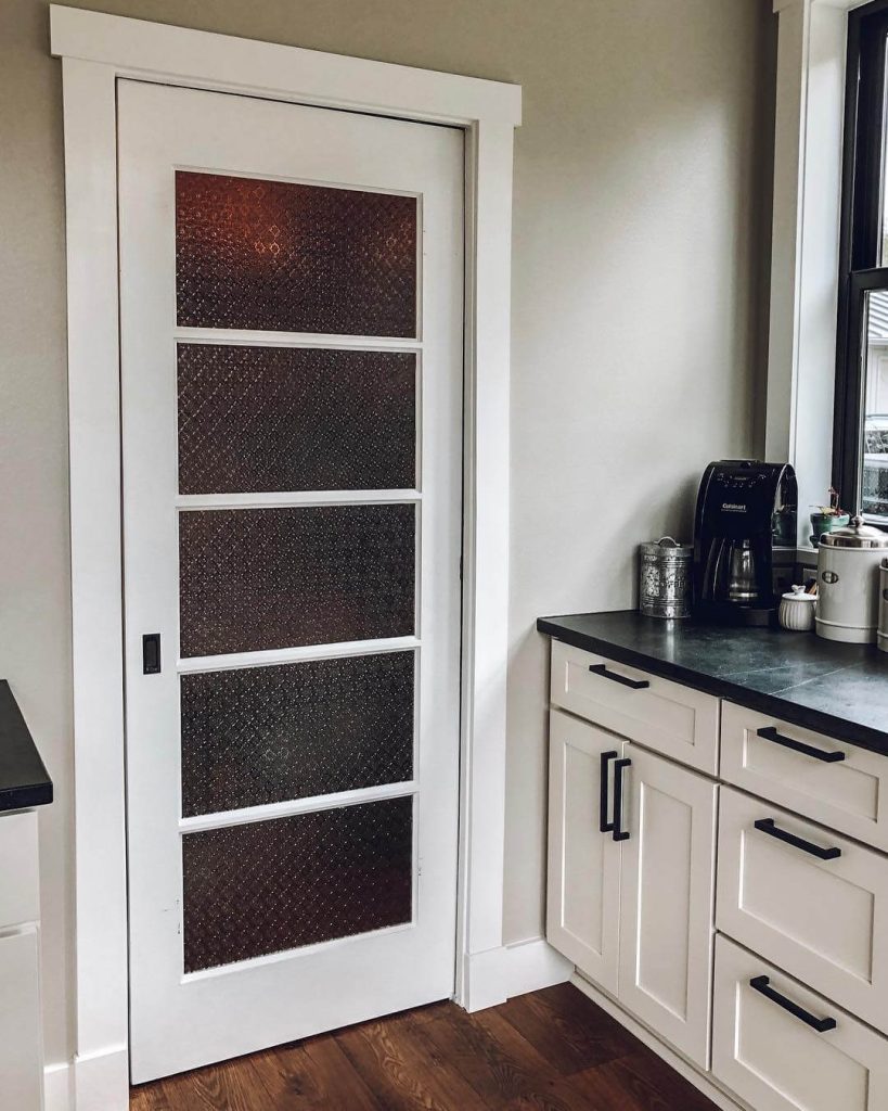 26. Textured Glass Panels for Subtle Privacy