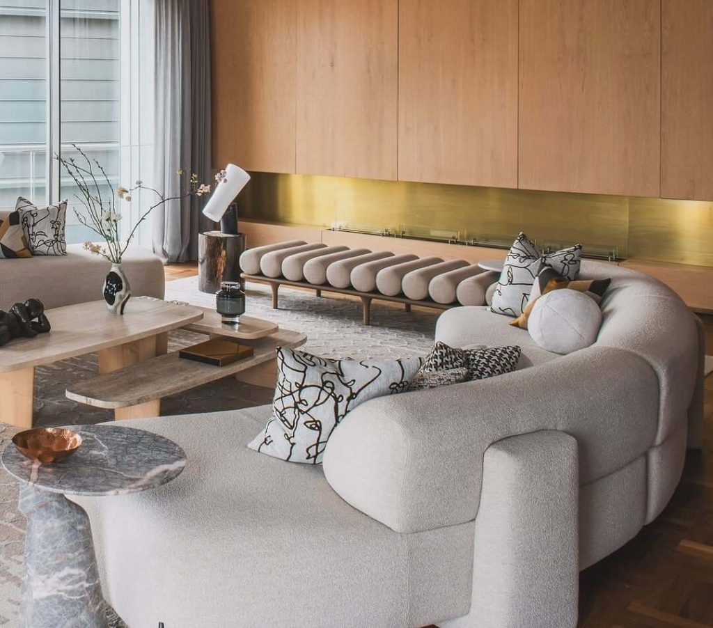 27. Japandi Interior Ideas Artistic Sofa Curve and Brass