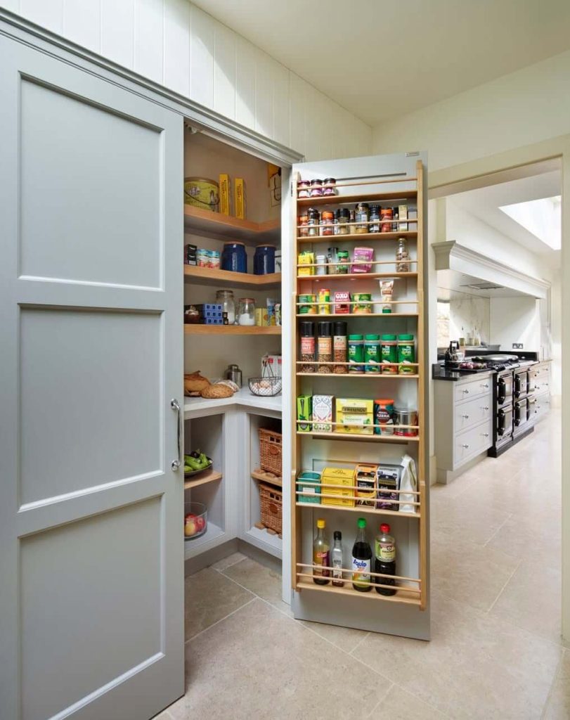 3. Space-Smart Storage Behind a Hidden Door