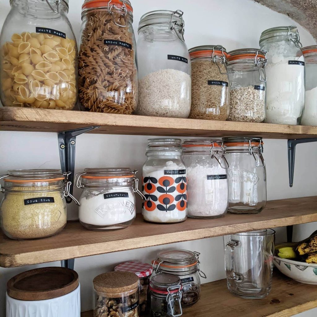 7. Choose Bracket-Mounted Wood Shelves for a Vintage Vibe