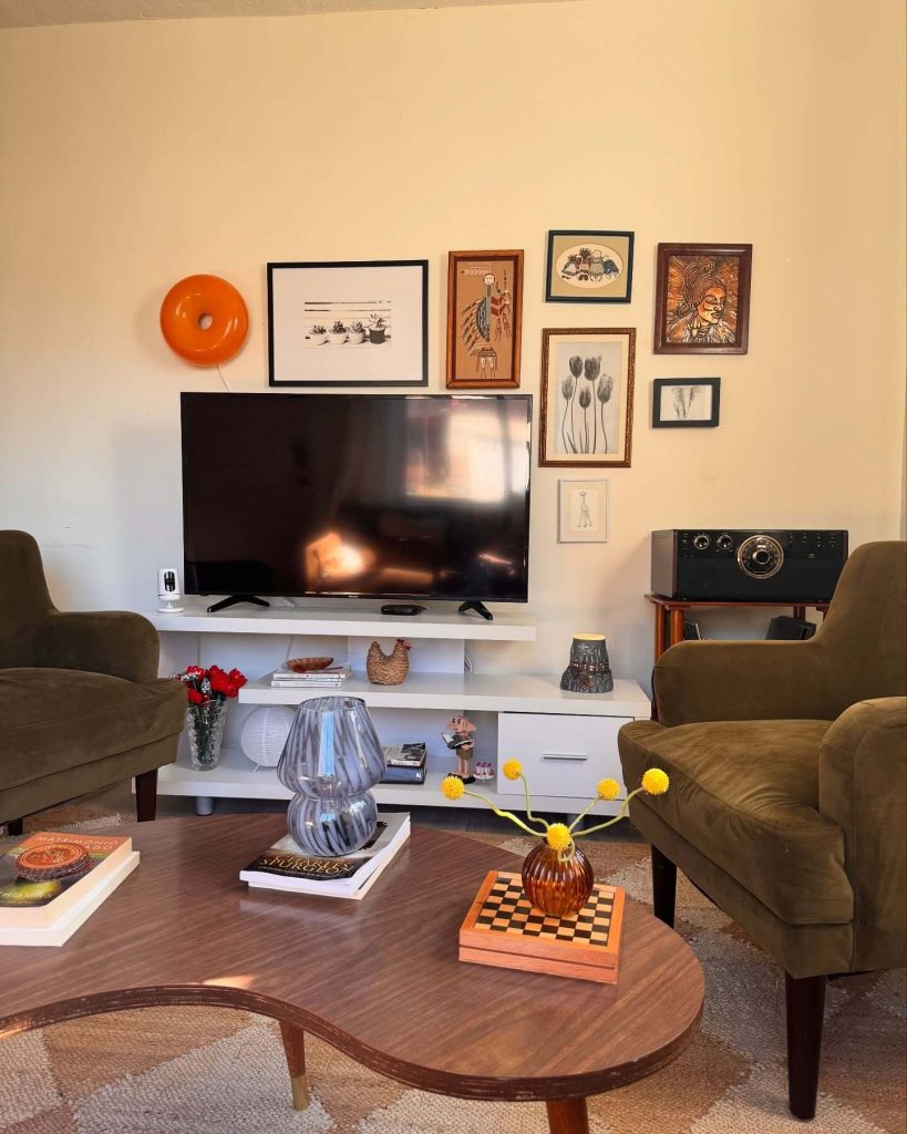 7. Eclectic Gallery Wall with Mid-Century Anchors