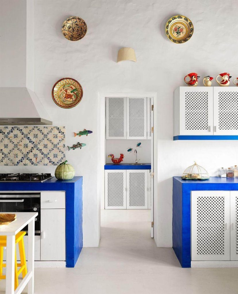7. Vibrant and Eclectic Above-Cabinet Display