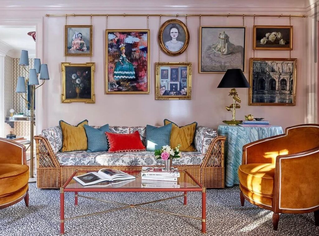 9. Elegant Picture Rail Display in a Sophisticated Lounge