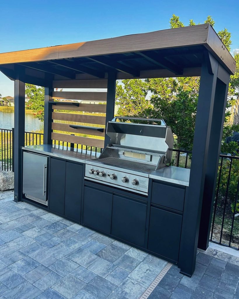1. Modern Pergola Kitchen with Sleek Black Cabinetry