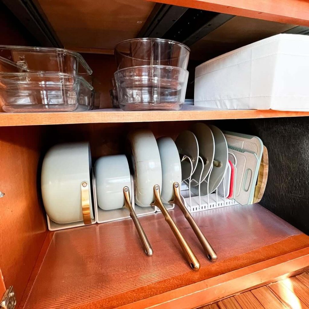 1. Use a Vertical Organizer to Maximize Cabinet Space